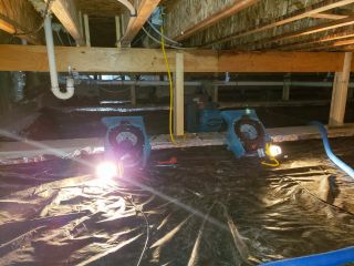 Fire & Water Restoration Services | Drywall Repair Hacienda Heights CA Fire damage restoration experts cleaning soot and debris in a Hacienda Heights home.